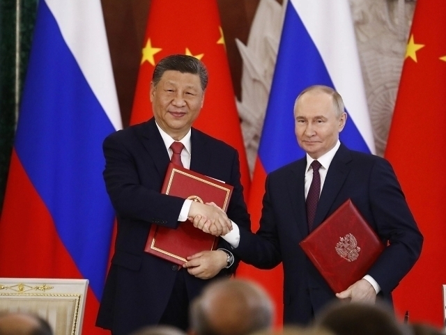Си ва Путин ШҲТ саммитида стратегик шерикликни янада мустаҳкамланганини билдирди