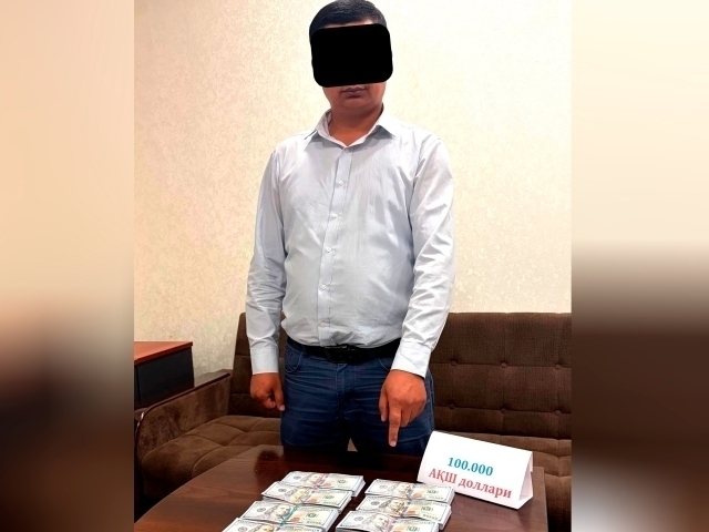 Тошкент вилоятида банкир 100 минг доллар билан ушланди